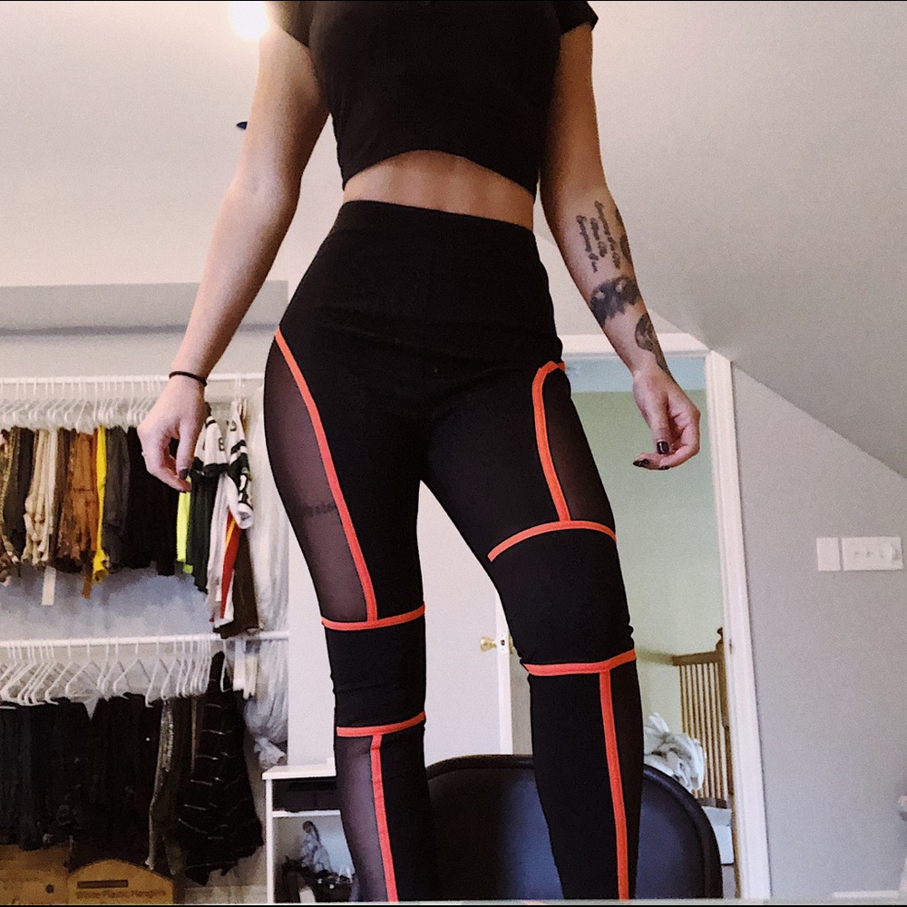 fashion nova neon orange and black leggings
